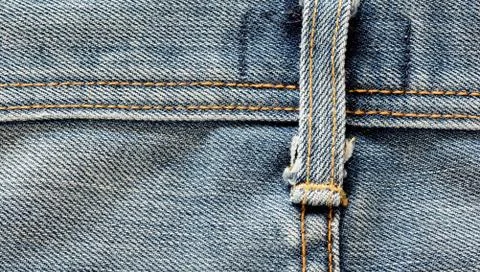Jeans texture with seam Stock Photos