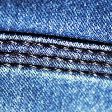 Jeans texture with seams Stock Photos