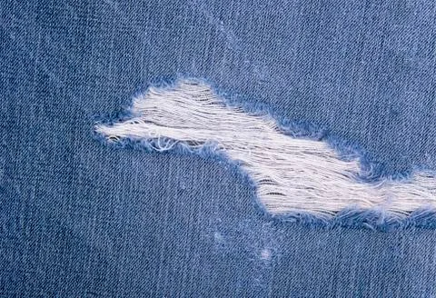 Jeans torn denim texture Stock Photos