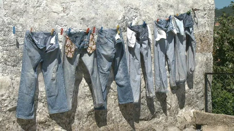 Jeans trousers drying Stock Footage 325307