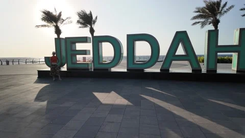 Jeddah Waterfront Corniche Sign at Sunset with Palm Trees in Saudi Arabia Stock Footage 308676029