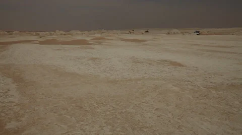 Jeep crossing the limestone ground of the White Desert, Egypt Stock Footage 36125668