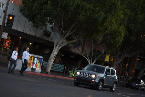Jeep Driving Down Mill Ave in Tempe AZ Stock Photos