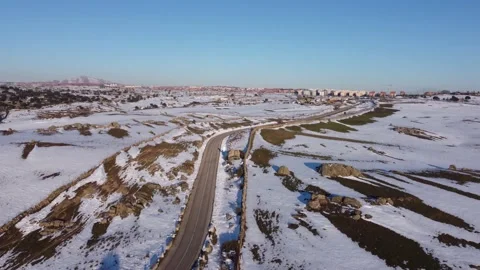 Jeep driving down a mountain in winter Stock Footage 158547849