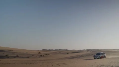 Jeep during Dune Bashing in Dubai's desert Stock Footage 236929329