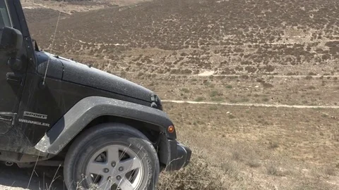 Jeep going down hill Stock Footage 82415275