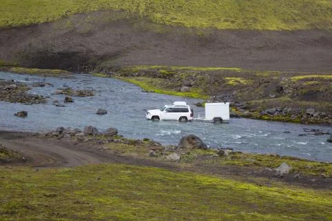 Jeep overcomes River Stock Photos