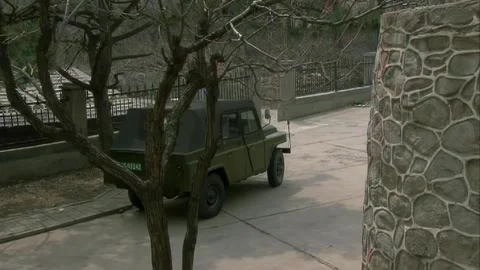 Jeep parked in the yard Stock Footage 253773787