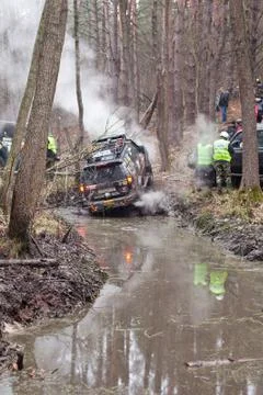 Jeep pulls the car out of the mud Stock Photos