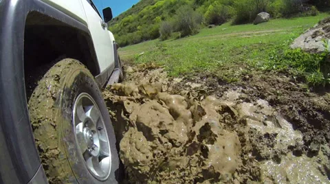 Jeep rides through the mud Stock Footage 38092634