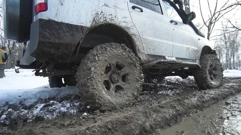Jeep rides through the mud Stock Footage 84389712