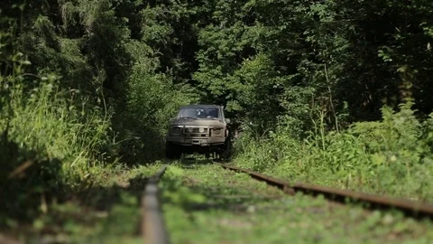 Jeep rides through the woods Stock-Footage 73004666