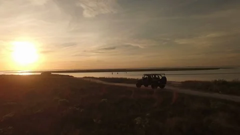 Jeep with a setting sun Stock Footage 90670629