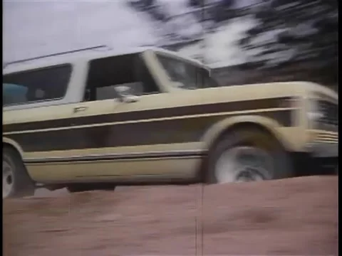 Jeep speeding down dirt road Stock Footage 260249476