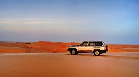 Jeep at the top of the dune Stock Photos