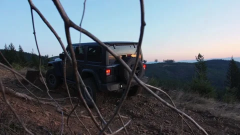 Jeep Wrangler driving through difficult gravel road in the mountains. Washington Stock-Footage 241963852