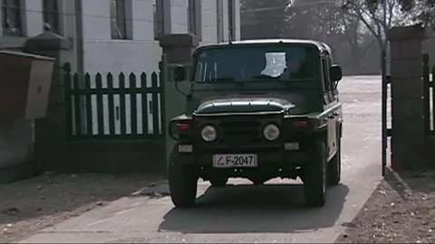 The jeep into the yard Stock Footage 235264496