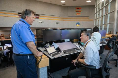 Jeff Spaulding, left, NASA test director, and NASAs Test, Launch and Recove.. Stock Photos