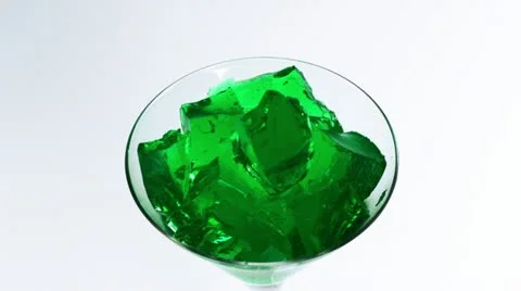 Jello falling on and bouncing, Slow Motion Stock Footage 12351908