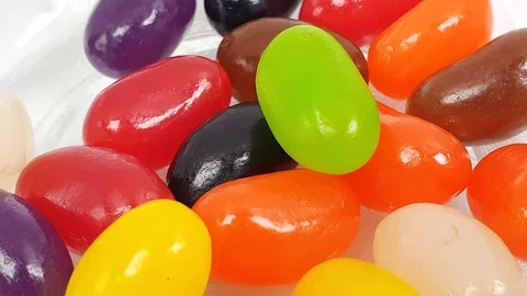 Jelly beans falling into container. Stock Footage 106721449