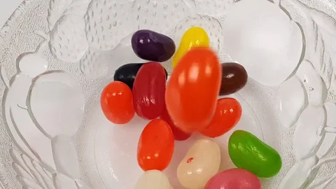 Jelly beans falling into container. Stock Footage 106721453