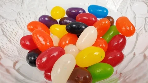 Jelly beans falling into container. Stock Footage 106721505