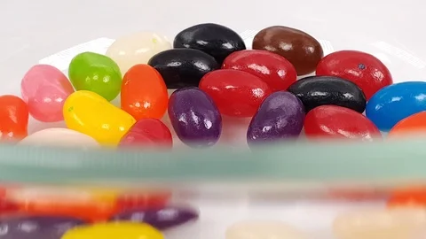 Jelly beans falling into container. Stock Footage 106721506
