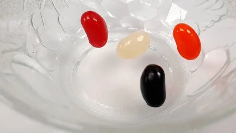 Jelly beans falling in slow motion 240fps Stock Footage 106695271