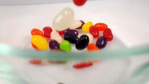 Jelly beans falling in slow motion 240fps Stock Footage 106695307