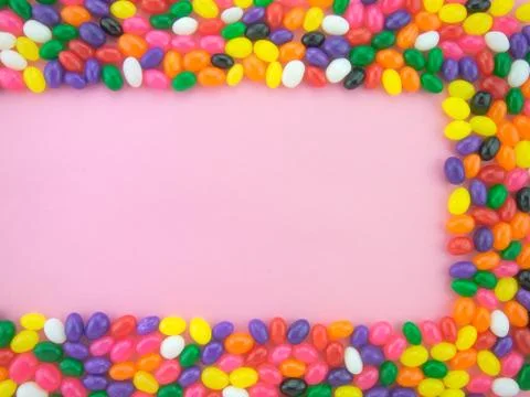 Jelly Beans Frame and Background ( Pink Background ) Stock Photos