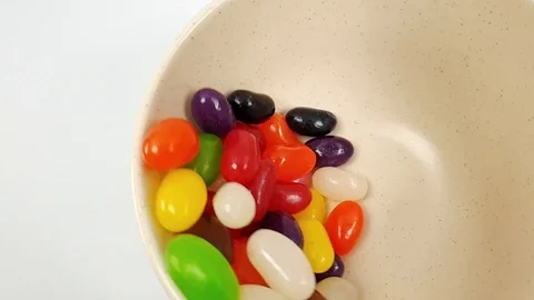 Jelly beans jumping in slow motion 240fps Stock Footage 106695355