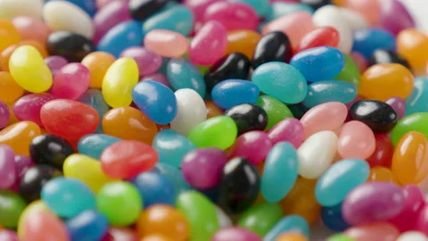 Jelly beans rotating loop multicolored off centre Stock Footage 138791404