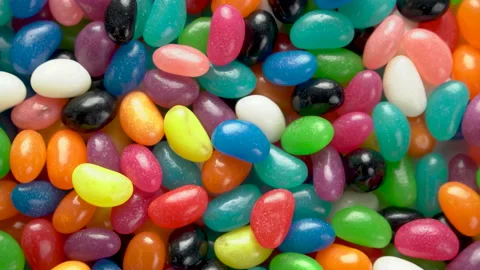 Jelly beans rotating overhead shot centred Stock Footage 138790523