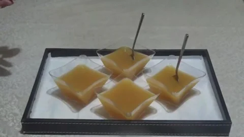 Jelly in cups on a tray Stock Footage 311528746