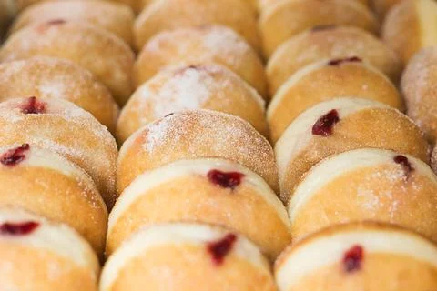 Jelly donuts in rows Stock Photos