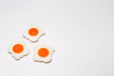 Jelly fried eggs on a white background Stock Photos