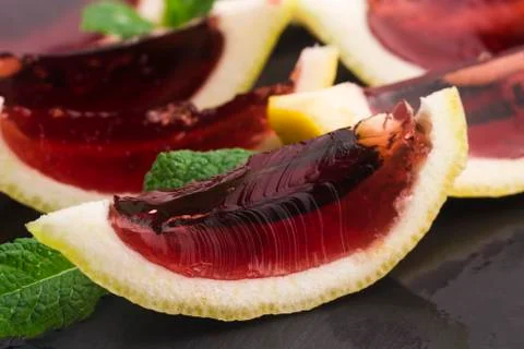 Jelly (jello) shots made out of carved lemon Stock Photos
