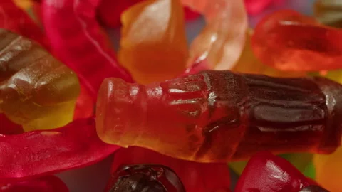 Jelly marmalade cola bottle bear close up, Confiture Bean candy jujube Marmalade Stock Footage 243669946
