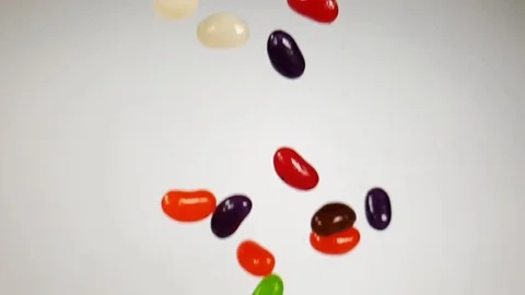 JellyBean3 - Jelly beans falling in 240fps slow motion video. Stock Footage 106257751