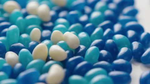 Jellybeans Rotating Loop blue white off centre Stock Footage 141095591