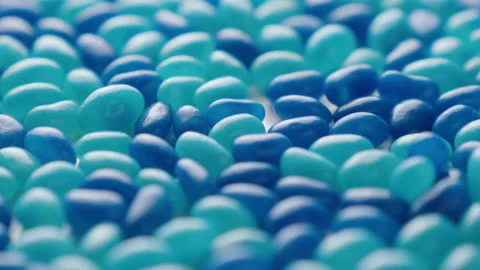 Jellybeans Rotating Loop off centre shades of blue Stock Footage 141095543