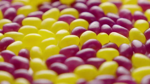 Jellybeans Rotating Loop purple and yellow centred Stock Footage 141095749
