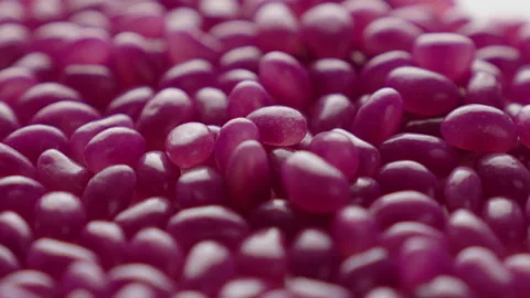 Jellybeans Rotating Loop purple off centre Stock Footage 141095482