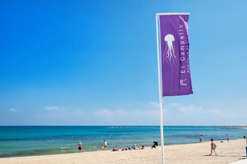 Jellyfish warning flag on the beach of El Campello. Alicante, Spain Stock Photos