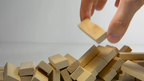 Jenga falls on the table, the tower falls. Stock Footage 129728252