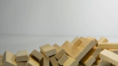 Jenga falls on the table, the tower falls. Stock Footage 129728253
