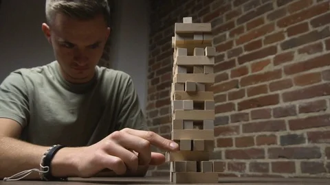 Jenga Tower Falls while Boy's Turn Видео 80679161