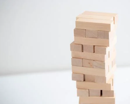Jenga tower on the white background Stock Photos