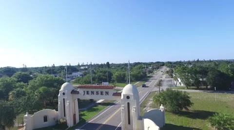 Jensen Beach Arches over road crane up Video stock 62526164