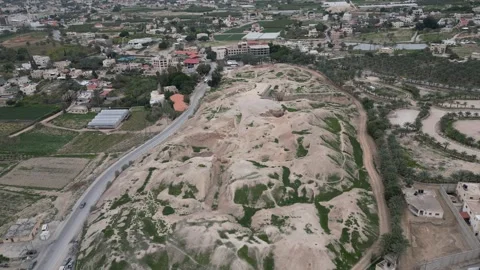 Jericho, Tell es-Sultan, Drone Flyover of Biblical Old City, 4K Stock Footage 297221091